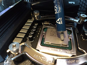 MX-4 thermal paste being applied to cpu