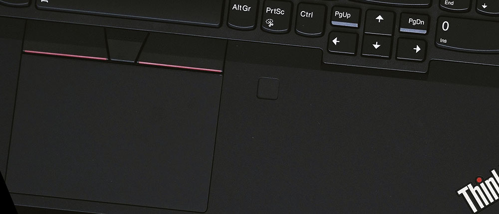 close up view of thinkpad laptop trackpad and keyboard